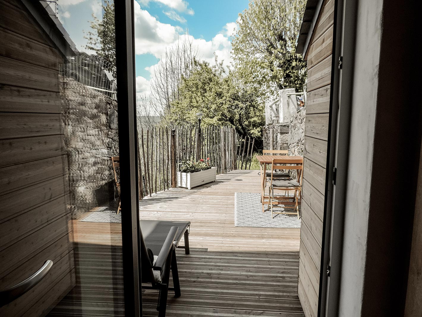 Holiday home Lott Mur de Barrez has an attractive outdoor setting with a wooden terrace and veranda